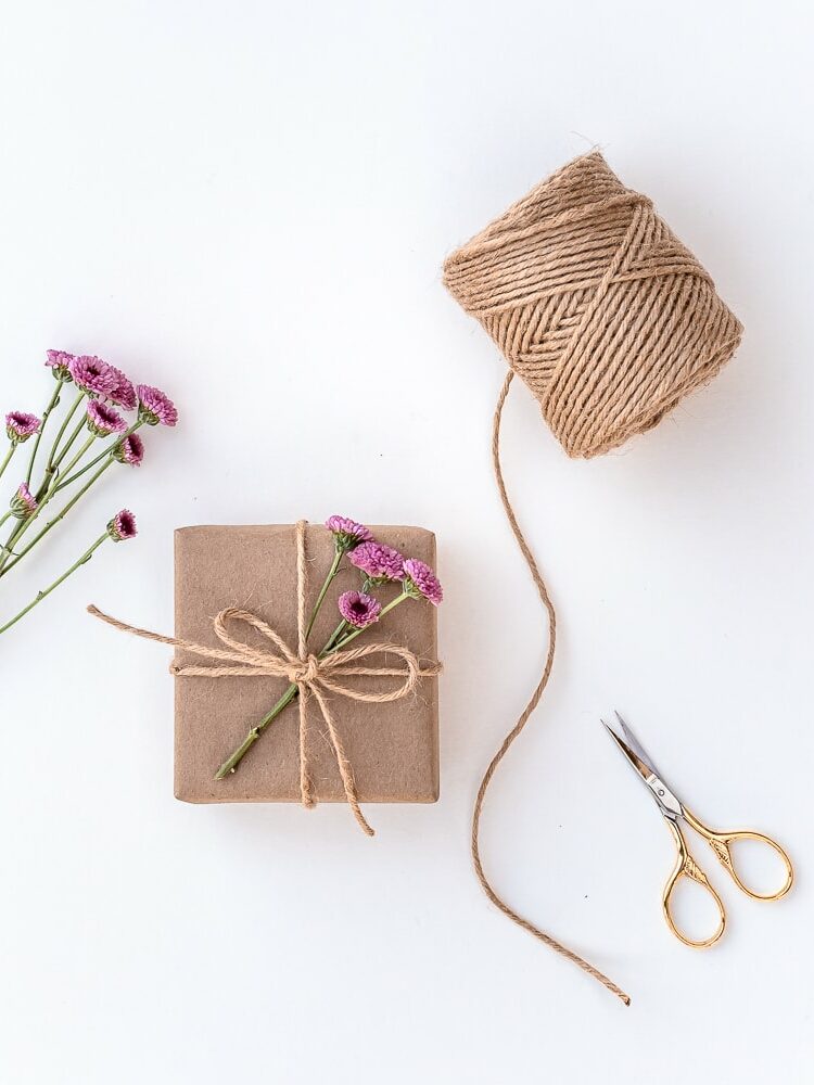 Gift wrapped with flowers and twine