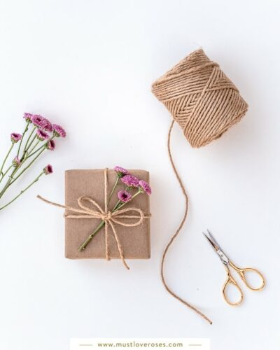 Gift wrapped with flowers and twine